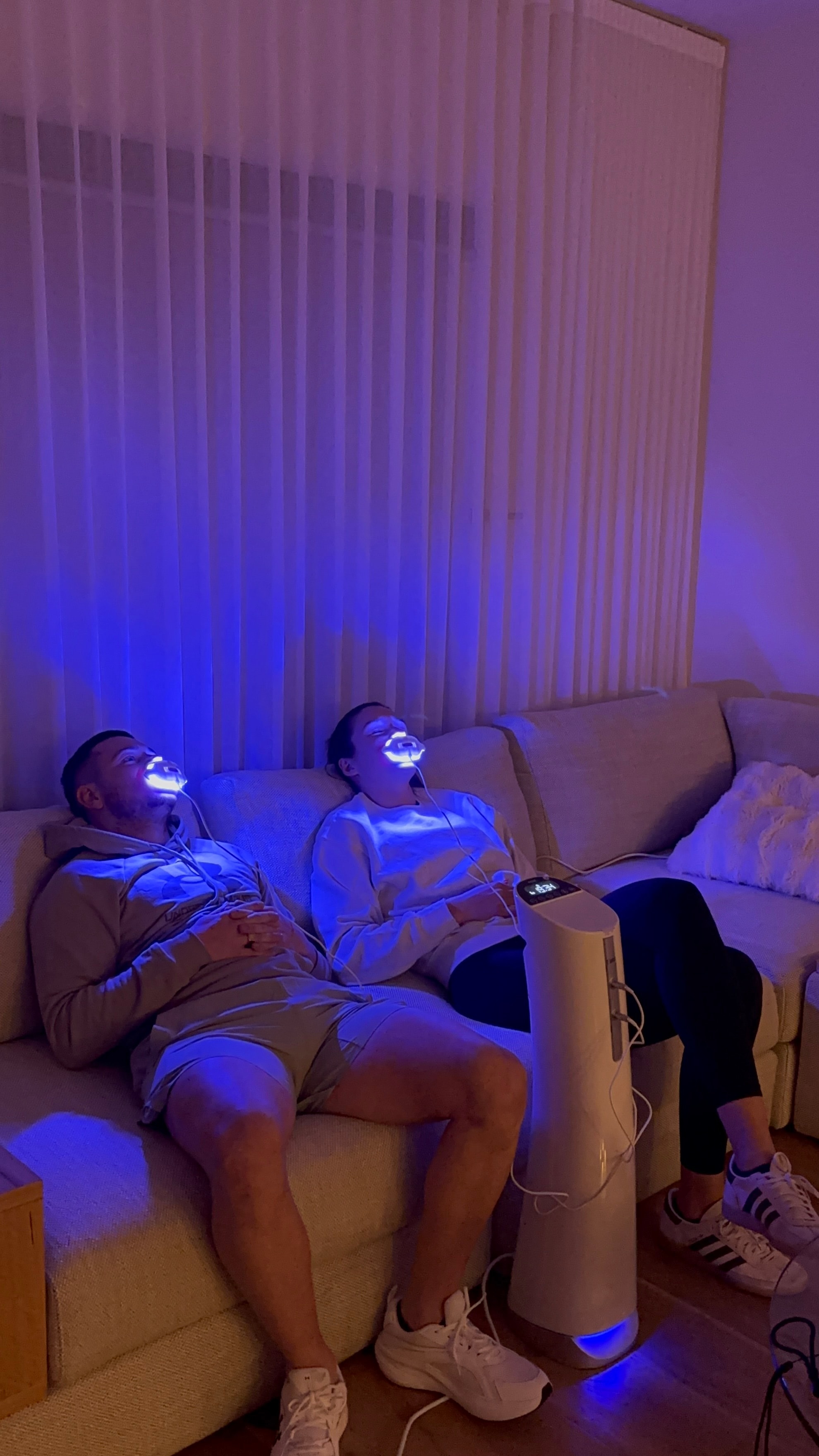 Two clients enjoying a teeth whitening session together at Signature Whitening Melbourne